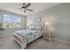 Guest bedroom with a queen-size bed and beach-themed decor at 43306 Water Bird Way # 6622, Punta Gorda, FL 33982