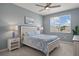 Another guest bedroom with a full-size bed and coastal decor at 43306 Water Bird Way # 6622, Punta Gorda, FL 33982