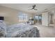 Main bedroom with private balcony access and en-suite bathroom at 43306 Water Bird Way # 6622, Punta Gorda, FL 33982