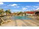 Relaxing resort-style pool with lounge chairs at 43306 Water Bird Way # 6622, Punta Gorda, FL 33982
