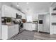 Modern white kitchen with stainless steel appliances at 4338 Shappell St, Port Charlotte, FL 33948