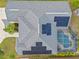 Top-down view of house featuring solar panels and a screened pool at 474 Orlando Blvd, Port Charlotte, FL 33954