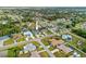 Aerial view of a single-Gathering home with a pool and solar panels at 474 Orlando Blvd, Port Charlotte, FL 33954