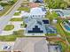 Aerial view of house showcasing solar panels and a screened pool at 474 Orlando Blvd, Port Charlotte, FL 33954