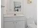 Simple, clean bathroom with single vanity and toilet at 474 Orlando Blvd, Port Charlotte, FL 33954