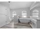 Bathroom with freestanding tub, separate walk in shower and modern vanity at 474 Orlando Blvd, Port Charlotte, FL 33954