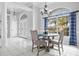 Bright dining room with table and chairs near window at 474 Orlando Blvd, Port Charlotte, FL 33954