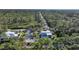 Aerial view of property, showcasing its spacious lot at 489 & 497 Campbell St, Port Charlotte, FL 33953