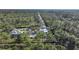 Aerial view showing home's location and surrounding landscape at 489 & 497 Campbell St, Port Charlotte, FL 33953