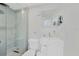 Clean bathroom with a shower, toilet, and white vanity at 489 & 497 Campbell St, Port Charlotte, FL 33953