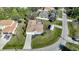 Aerial view of a house and neighborhood, showing surrounding homes and street at 4959 Cromey Rd, North Port, FL 34288