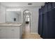 Bathroom with double vanity and hallway view at 4959 Cromey Rd, North Port, FL 34288