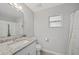 Clean bathroom with granite countertop and shower/tub combo at 4959 Cromey Rd, North Port, FL 34288