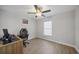 Simple bedroom with wood desk and gaming chair at 4959 Cromey Rd, North Port, FL 34288