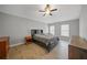 Main bedroom with double dresser and ceiling fan at 4959 Cromey Rd, North Port, FL 34288