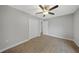 Spacious bedroom with tile floors and double closets at 4959 Cromey Rd, North Port, FL 34288