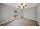 Bright bedroom with tile flooring and ceiling fan at 4959 Cromey Rd, North Port, FL 34288