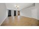 Living room with tile floors, vaulted ceiling and front door at 4959 Cromey Rd, North Port, FL 34288