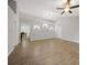 Spacious living room with tile floors and vaulted ceilings at 4959 Cromey Rd, North Port, FL 34288