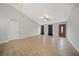 Living room with tile floors, vaulted ceiling and front door at 4959 Cromey Rd, North Port, FL 34288