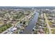 Aerial view showing waterfront homes and community at 498 E Tarpon Nw Blvd, Port Charlotte, FL 33952