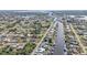 Aerial view of canal-front homes and surrounding area at 498 E Tarpon Nw Blvd, Port Charlotte, FL 33952