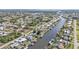 Aerial view of canal-front homes and community at 498 E Tarpon Nw Blvd, Port Charlotte, FL 33952