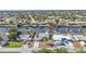 Bird's-eye view showing home's location on canal, close to other houses at 498 E Tarpon Nw Blvd, Port Charlotte, FL 33952