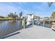 Convenient boat lift and seating on this private dock at 498 E Tarpon Nw Blvd, Port Charlotte, FL 33952