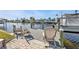 Enjoy waterfront living with this relaxing dock and seating area at 498 E Tarpon Nw Blvd, Port Charlotte, FL 33952