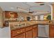 Granite countertops and stainless steel sink in kitchen at 498 E Tarpon Nw Blvd, Port Charlotte, FL 33952