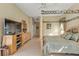 Main bedroom with a four-poster bed and built-in dresser at 5189 Collingswood Blvd, Port Charlotte, FL 33948