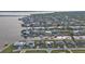 Scenic aerial view of waterfront homes along canals, offering boating access and coastal living at 5194 Fleming St, Port Charlotte, FL 33981