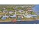 Waterfront community featuring single-Gathering homes with private docks and a convenient circular street layout at 5194 Fleming St, Port Charlotte, FL 33981