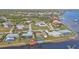 Waterfront community featuring beautiful single-Gathering homes with private docks and lush landscaping at 5194 Fleming St, Port Charlotte, FL 33981