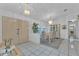 Bright dining area with tiled floor and view of the front door at 5194 Fleming St, Port Charlotte, FL 33981