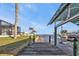 Wooden dock extending into the water, providing a scenic view and direct water access at 5194 Fleming St, Port Charlotte, FL 33981