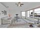 Inviting living room with tile flooring, comfortable white sofa, and views of the water from large windows at 5194 Fleming St, Port Charlotte, FL 33981