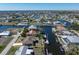 Aerial view of canal-front home with large lot and boat slip at 520 Boardman Dr, Punta Gorda, FL 33950