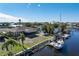 Aerial view of property showing large lot and private dock on the canal at 520 Boardman Dr, Punta Gorda, FL 33950