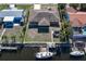 Aerial view of the house and backyard with canal access at 520 Boardman Dr, Punta Gorda, FL 33950