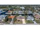 Aerial view of single story home on a large lot, situated on a canal at 520 Boardman Dr, Punta Gorda, FL 33950