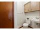 Small bathroom with toilet and sink at 520 Boardman Dr, Punta Gorda, FL 33950