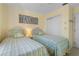 Guest bedroom with twin beds, and plenty of closet space at 520 Boardman Dr, Punta Gorda, FL 33950