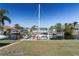 Private dock with sailboat, offering canal access and waterfront views at 520 Boardman Dr, Punta Gorda, FL 33950