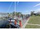 Private dock with seating area and sailboat at 520 Boardman Dr, Punta Gorda, FL 33950