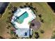 Bird's-eye view of resort-style pool and clubhouse at 5277 Shell Mound Cir, Punta Gorda, FL 33982