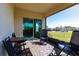 Screened porch with seating, table, and view of neighborhood at 5277 Shell Mound Cir, Punta Gorda, FL 33982