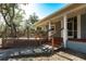 Spacious deck with lattice railings and brick patio at 5301 Sabal Palm Ln, Punta Gorda, FL 33982