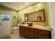 Bathroom with walk-in shower and granite vanity at 7233 N Plum Tree, Punta Gorda, FL 33955